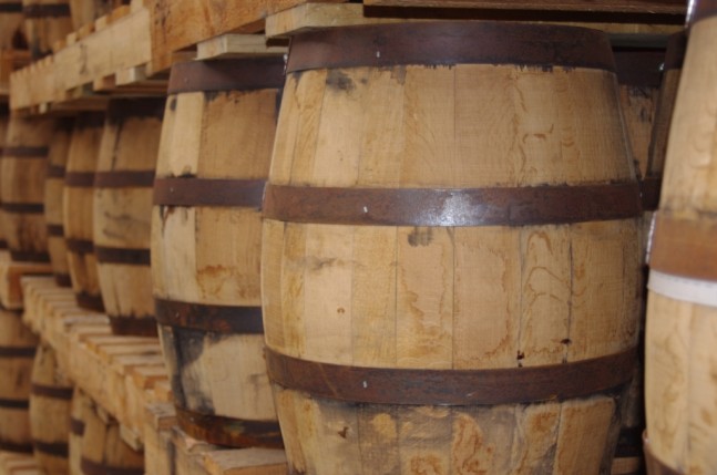 There is an awful lot of whisky in barrel at the distillery. The-barrels-are-now-kept-standing-up-as they are easier to move around than when lying in cradles